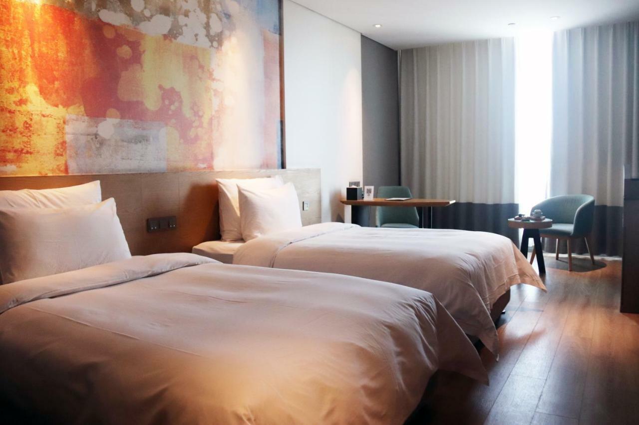 M Hotel Zhengzhou Exteriör bild
